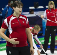 curling pregnant woman - thumbnail