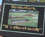 Protest sign - shovel ready