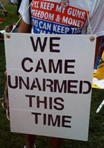 Protest sign - we came unarmed