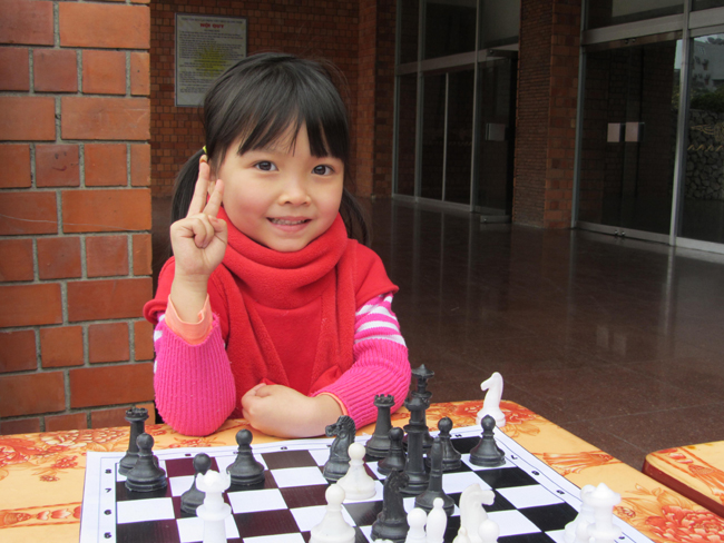 This chess cherub would have defeated me in three minutes had I not utilized a daring, obscure strategy – the Wizard’s Distraction: I exclaim, “Look, a scary monster!”, my opponent turns to look, and I steal her bishop.
