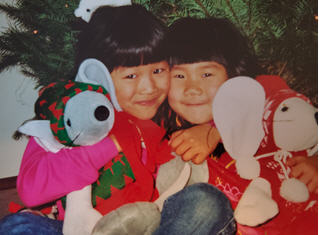 One of the many photos of Rachel (L) and Emily (R) from early childhood. I am guessing they are roughly 5 and 4 in this photo.